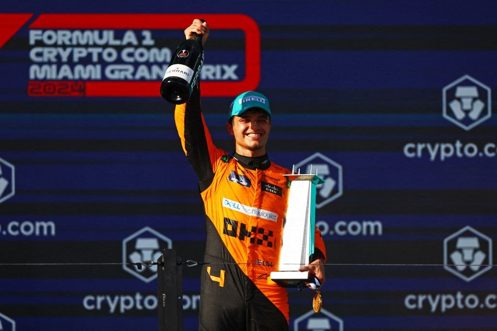 MIAMI, FLORIDA - MAY 05: Race winner Lando Norris of Great Britain and McLaren celebrates on the podium during the F1 Grand Prix of Miami at Miami International Autodrome on May 05, 2024 in Miami, Florida.   Mark Thompson/Getty Images/AFP (Photo by Mark Thompson / GETTY IMAGES NORTH AMERICA / Getty Images via AFP)